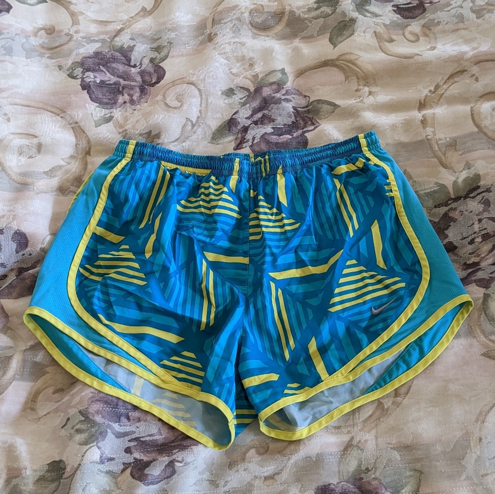 NIKE Teal and yellow Running Shorts